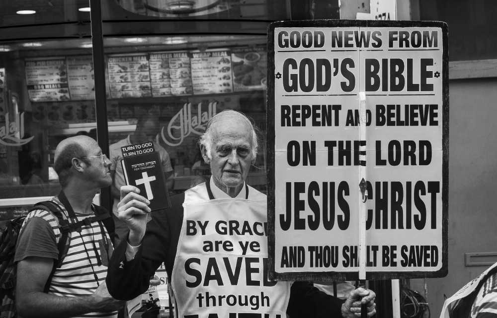 set fire to the preacher who is promising us hell