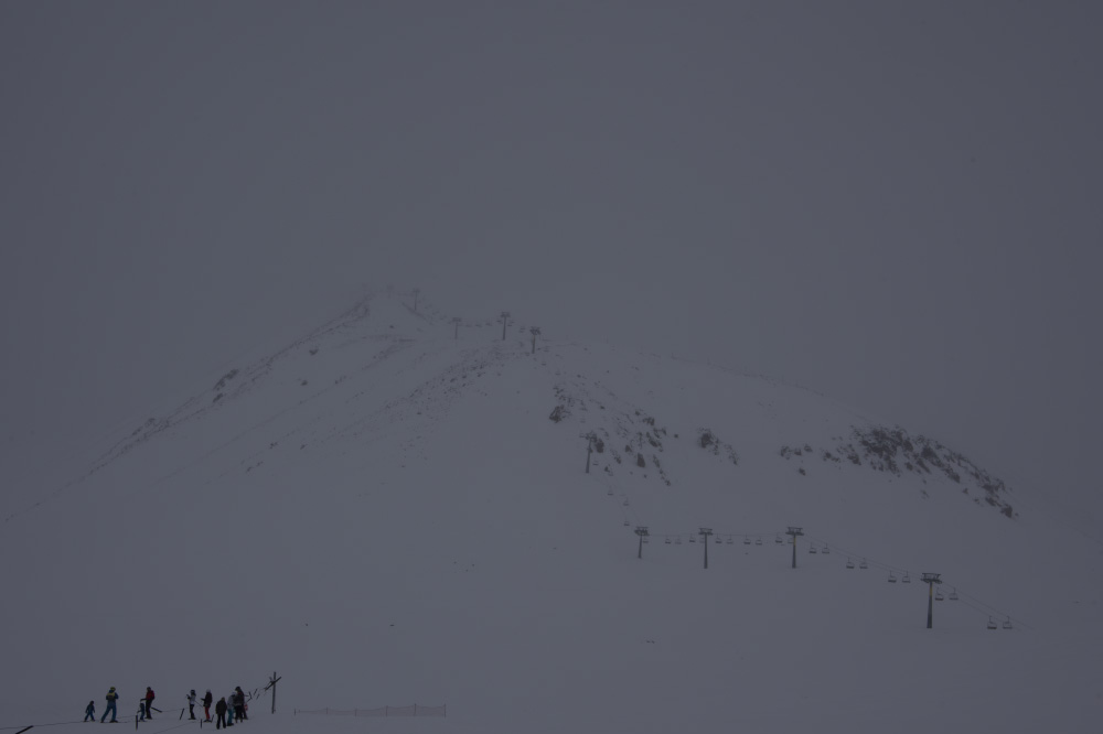 in a cage, on a hill